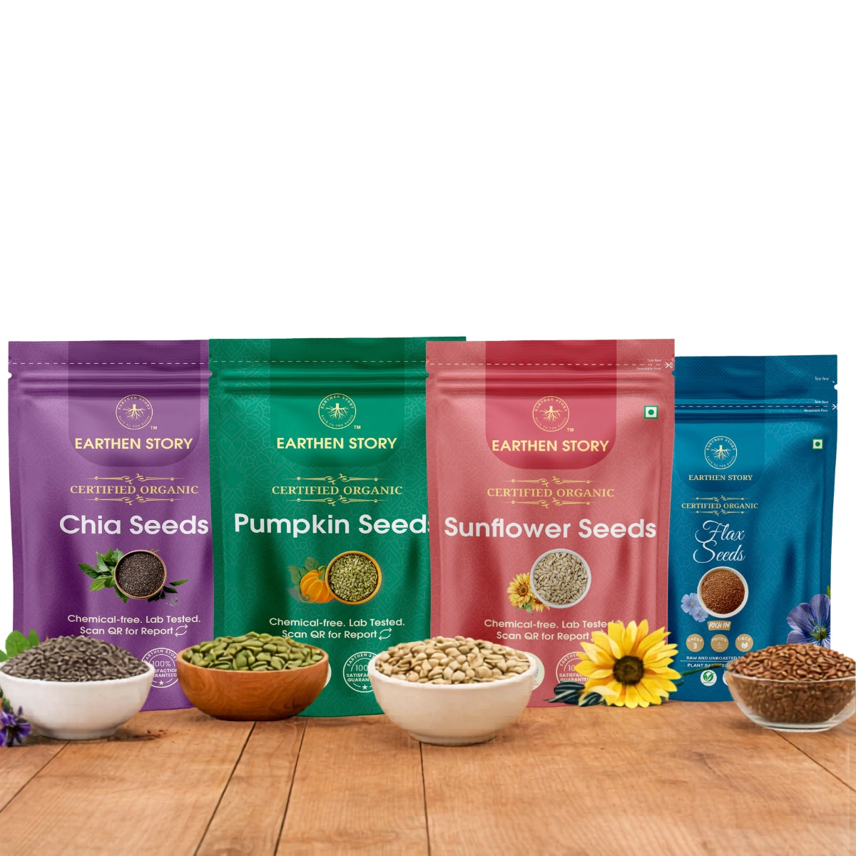 Daily Seeds Mix Bundle with chia seeds, flax seeds, pumpkin seeds, and sunflower seeds on a plain white background on a wooden desk.