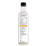 Earthen Story Organic Coconut Oil bottle back label showing nutrition facts, ingredients, and product information