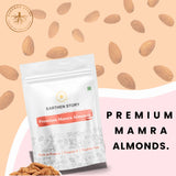 Earthen Story Premium Mamra Almonds pouch with scattered almonds on beige background