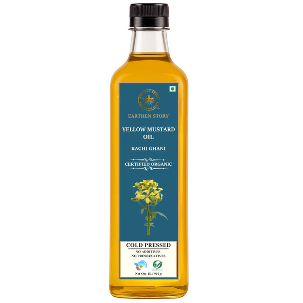 Earthen Story certified organic cold pressed yellow mustard oil in bottle with blue label